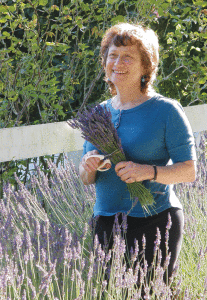 Renee Shepherd of Renee's Garden in a field of lavender