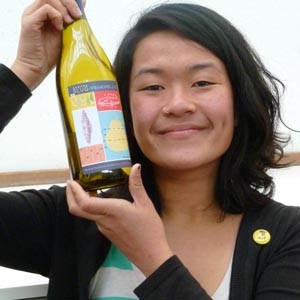 Louise Leong with Banana Slug Roussane and her new original design. Photo by Christina Waters.