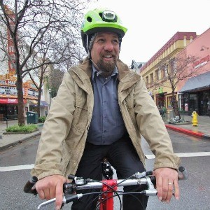 Santa Cruz Councilmember Micah Posner believes the city’s bike distribution should go back to a nonprofit like the Bike Church, rather than to auction. Photo by Chip Scheuer