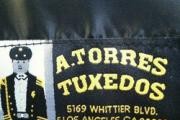 A Torres Tuxedo logo